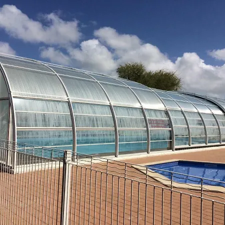 Casa de Férias Maison Climatisee Avec Piscine
